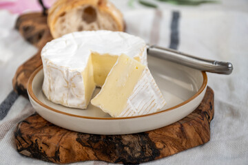 French soft Camembert cheese, original Camembert de Normandie made from raw cow milk