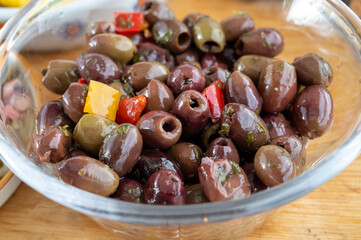 Pickled and marinated olives Ligurian style, tasty Italian starters, antipasti, tapas