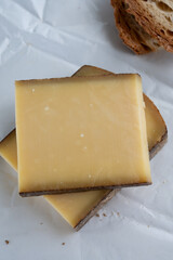 French aged in caves cheese Comte, made from unpasteurised cow milk Prestige,  Vieille Reserve close up