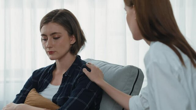 Supportive and comforting hands cheering up depressed patient person or stressed mind with prim empathy. Psychologist reassuring stressful and sad patient in clinic.