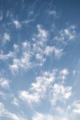 gentle white clouds in the blue sky