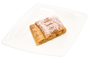 Slice of sweet apple strudel cake on a white plate with white background