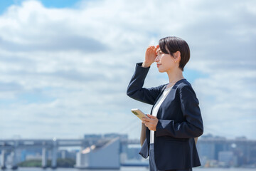 Obraz premium 女性 スマートフォン