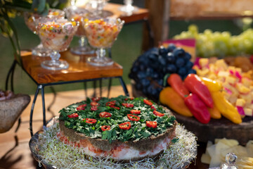 table with food breads, fruits cheeses party decoration healthy foods