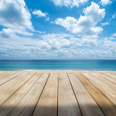 Fototapeta premium serene wooden deck overlooks tranquil beach and ocean, with fluffy clouds scattered across bright blue sky. This picturesque scene invites relaxation and peace