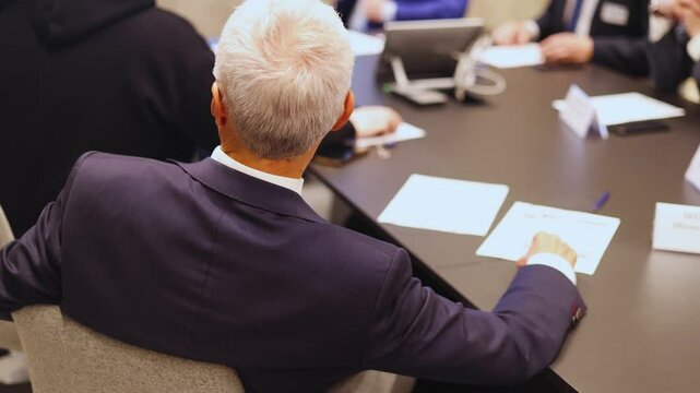 Board of directors in meeting room, Company executive director and management at the table, global corporation boss, parters team and investors, CEO back view, discussing project and planning strategy
