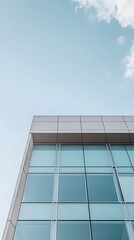 Fototapeta premium Modern Office Building with Clear Sky Background