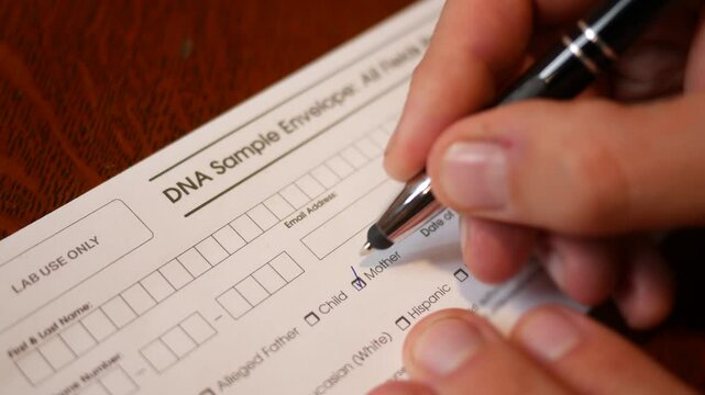 Man collects a paternity sample from a Mother