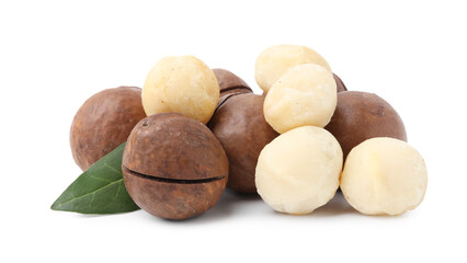Macadamia nuts with shells isolated on white