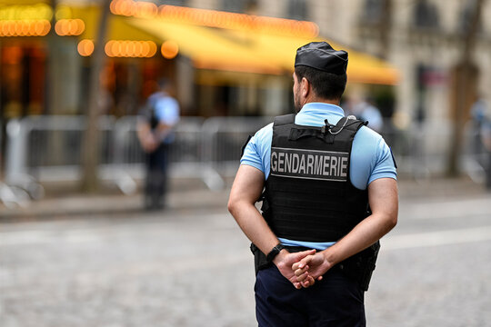 Illustration picture showing a male police officer (man) with uniform from gendarmerie ensuring security in Paris, France. French national policeman in action.