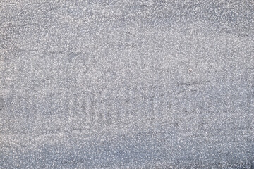 Frost on a wooden surface. Natural background of hoar-frost.