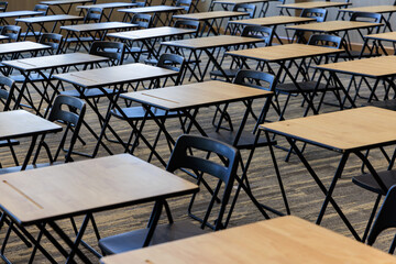 classroom with many empty desks and chairs. The room is empty and quiet