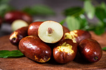 Fresh raw jujubes fruits on table.
