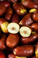 Fresh raw jujubes fruits on table.