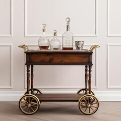 Antique wooden bar cart with brass wheels, topped with vintage glass decanters and an ornate silver tray