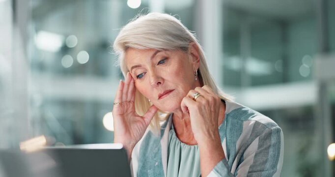 Headache, mature woman or stress in office for finance, company debt or overwhelmed in business. Female administrator, frustrated or anxiety at desk for budget crisis, tired or brain fog at computer
