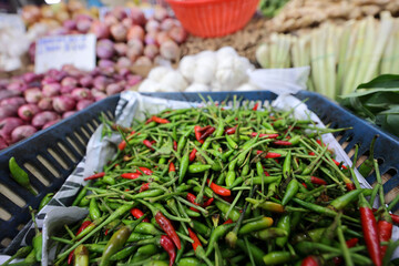 Early morning products and produce at Malaysian wet market selling fish beef chicken fruit vegetable grocery