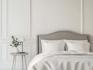 white minimalist bedroom with grey headboard and side table