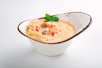 Tom Yam kung soup with shrimp and coconut milk. Traditional Thai