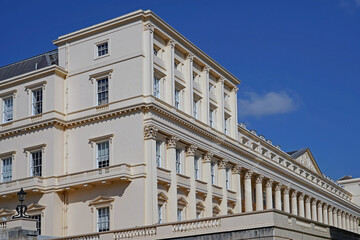 Obraz premium Carlton House Terrace in London, a long row of elegant classical style townhouses from the early 19th century