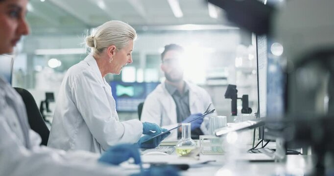 Clipboard, collaboration and science with doctors in lab for breakthrough, report or research. Computer, innovation and solution with people working together for discovery of pharmaceutical medicine