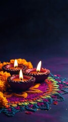 Multiple diyas forming a ring around a colorful rangoli with a diya in center, marigold garlands draped alongside, on a dark violet backdrop, copy space, happy Diwali background, traditional