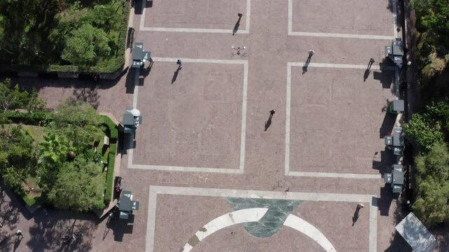 Aerial images following a drone as a protagonist through the streets of Zapopan Mexico, The drone travels through the main streets of this city. 