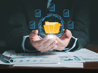 Businessman holding a virtual document file icon. document data technology. Online documentation database and process automation to efficiently manage files. Document management system concept. .