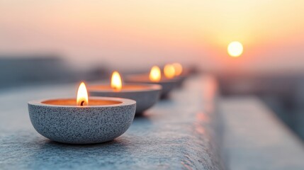 Tranquil sunset with glowing candles on a ledge