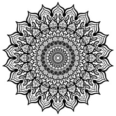 A detailed black and white mandala featuring intricate floral patterns arranged in a radial design.