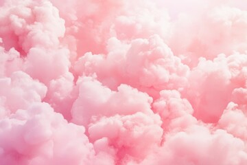 Pink pastel background with fluffy clouds.