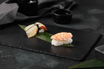 Elegant Sushi with Shrimp and Eel on Slate Plate Dark Minimalist Food Photography