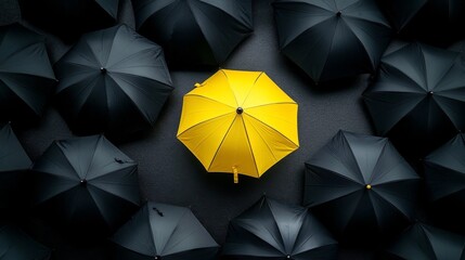 Group black umbrellas arranged random pattern dark grey Top view