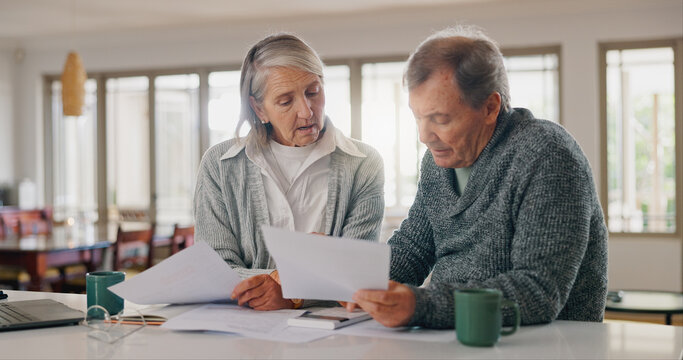 Senior couple, documents and budget planning with finance for pension, investment or expenses at home. Elderly, man and woman with paperwork for bills, funding or payments together on table at house