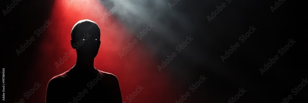 Poster the atmosphere is thick with tension as a lone figure is cast in stark light against a backdrop of d