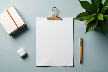 You can see a clipboard with a piece of paper resting on top of it