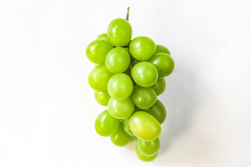 bunch of green grapes isolated on white background