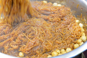 Fish balls, baked with glass noodles, very appetizing.