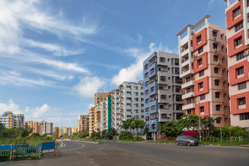 Residential high-rise apartment buildings with view of city road at Rajarhat area at Kolkata, India.	