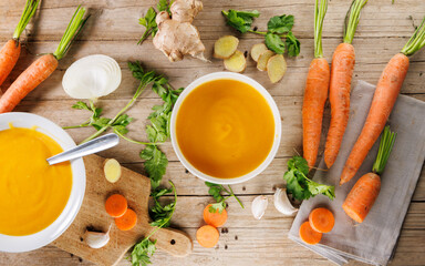 Bowl of creamy carrot soup. Ideal for healthy meals, vegetarian dishes, and comfort food concepts