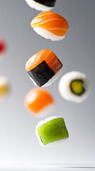 A variety of colorful sushi pieces, including salmon nigiri and maki rolls, float suspended in mid-air.