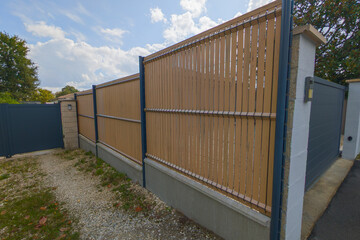 wall wooden fence with pillar steel structure street wood barrier modern house protect view home