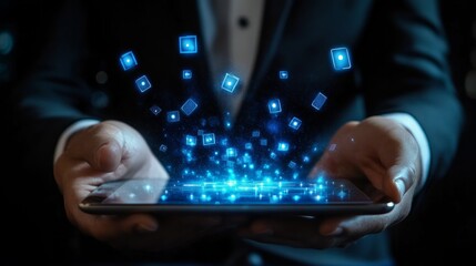 Close up of businessman hands holding tablet with creative digital blue cards hologram on dark background. Online casino, poker and digital gaming concept 