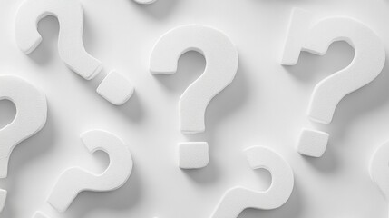 Questions in various sizes arranged on a white background, inviting curiosity and contemplation about life's uncertainties and mysteries