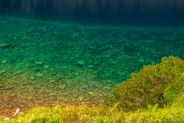 Alpine lake landscape, Morskie Oko or Sea Eye in high Tatras mountain of Tatra national park, Poland