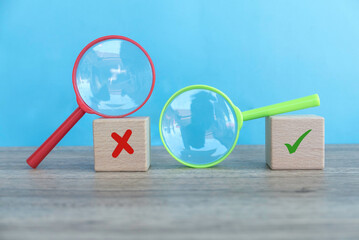Concept of evaluation. True or false symbol. Accepted or rejected. Yes or no icon over a wooden...
