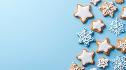 Festive sugar cookies with icing on a blue background for the holidays