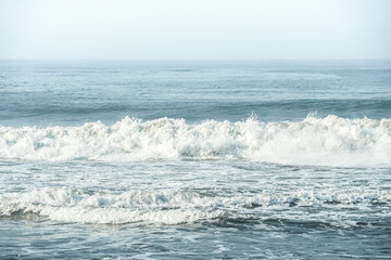 Dangerous high tide wave on the beach. Congot beach Kulon Progo, Yogyakarta, Indonesia.