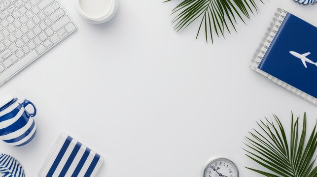 Top view of travel and creativity workspace with palm leaves and supplies