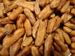 Close up of organic thai banana. Sun dried banana. Fruit snack. Musa (AA group) “Kluai Leb Mu Nang”